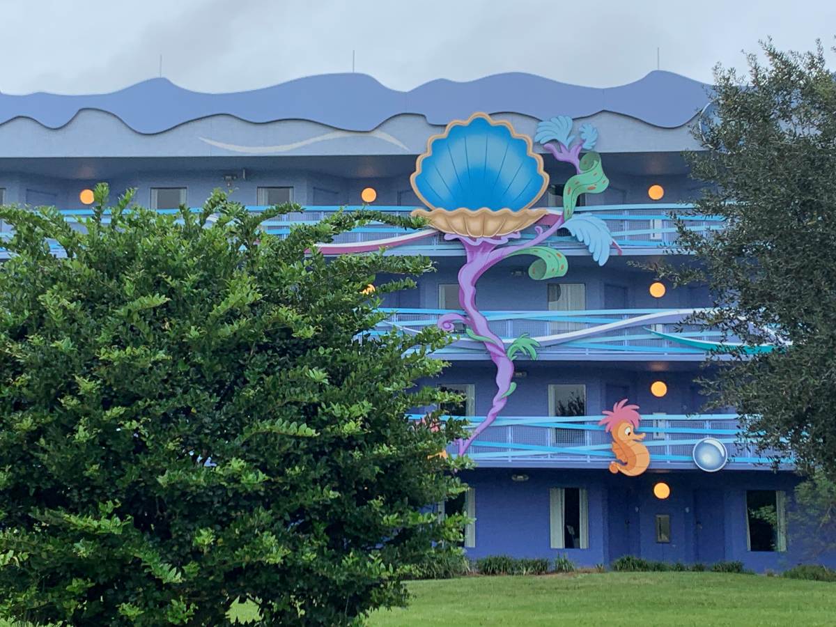 cheapest disney world resort for a family of 5 like the front of Art of Animation resort
