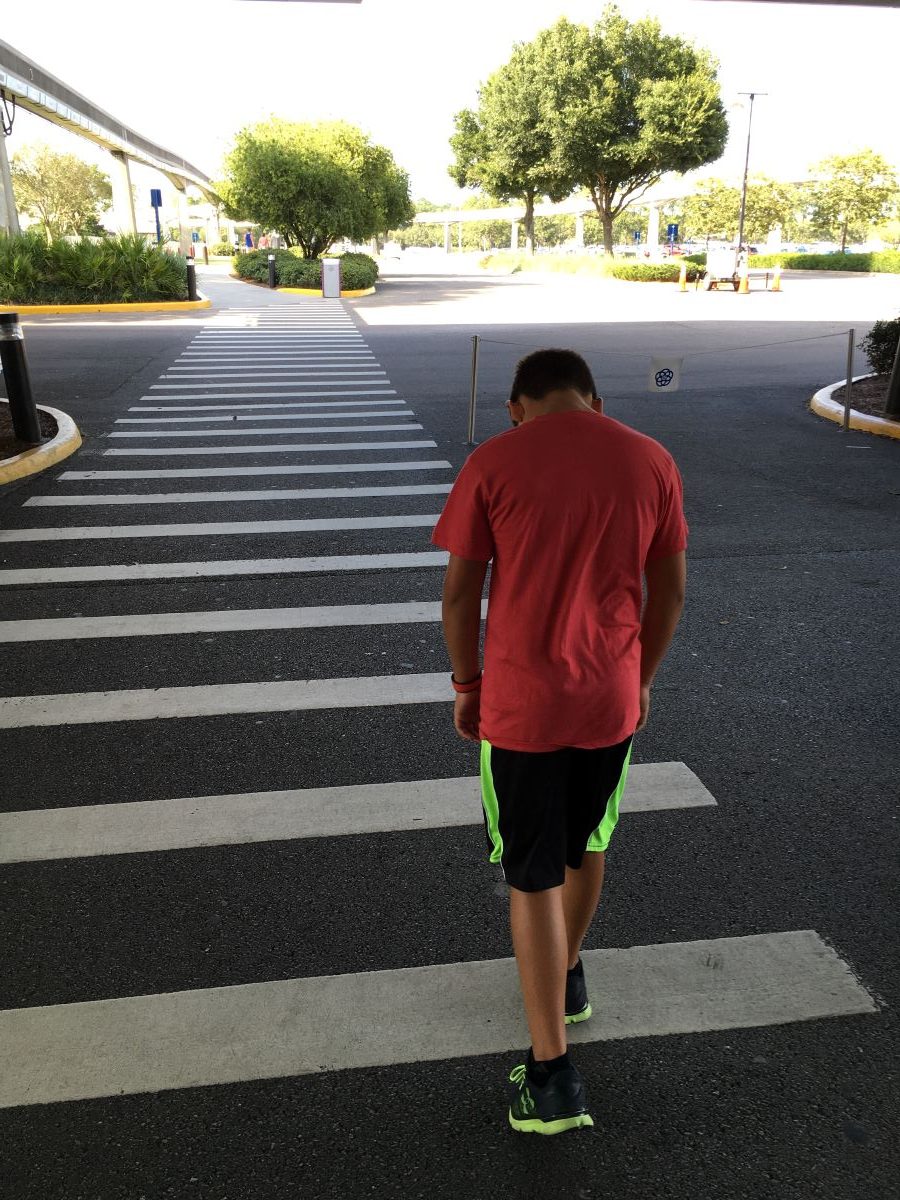 boy walking to epcot